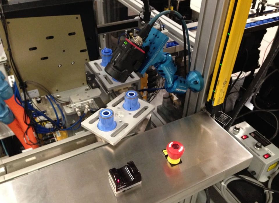 Keyence camera system inspecting parts on Magne Motion conveyor