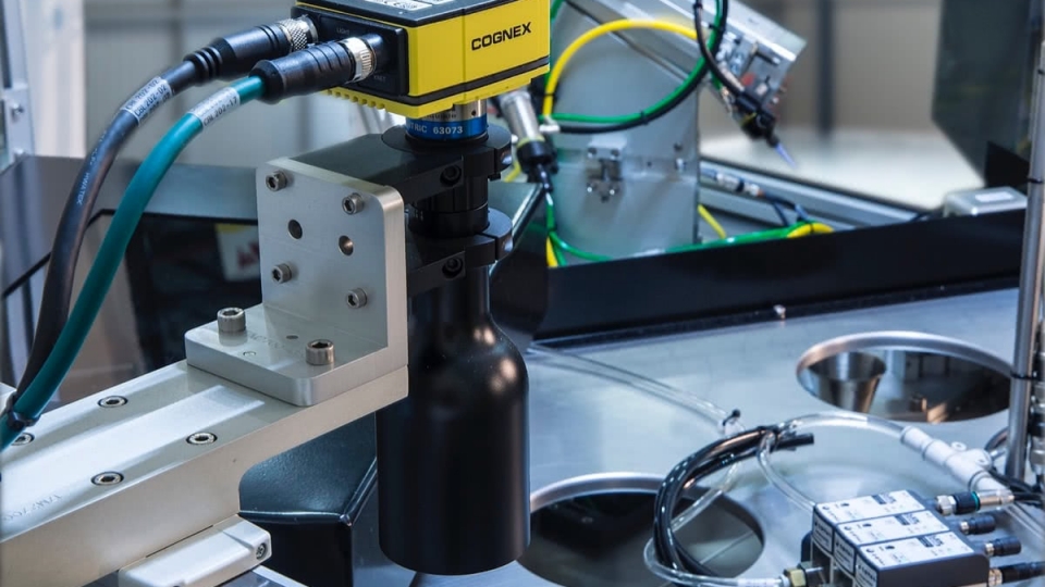 Cognex machine vision system inspecting components on automation line
